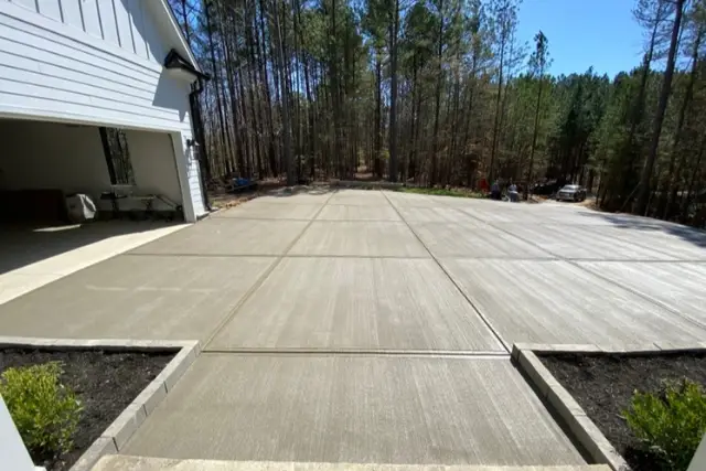 A recently finished driveway replacement and extension project in Raleigh, NC showcasing RG Pack's craftsmanship.