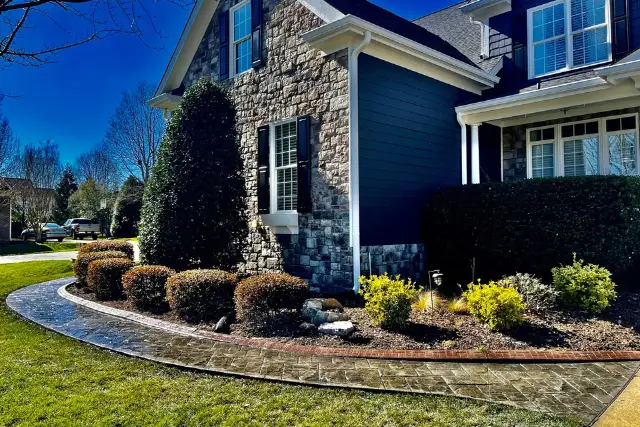 Decorative concrete walkway installation at a residential home in Raleigh, NC